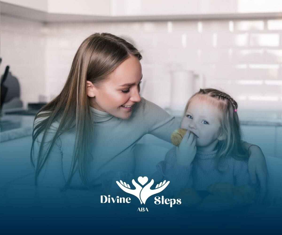 A mother and autistic child sitting in a kitchen after in-home ABA therapy.