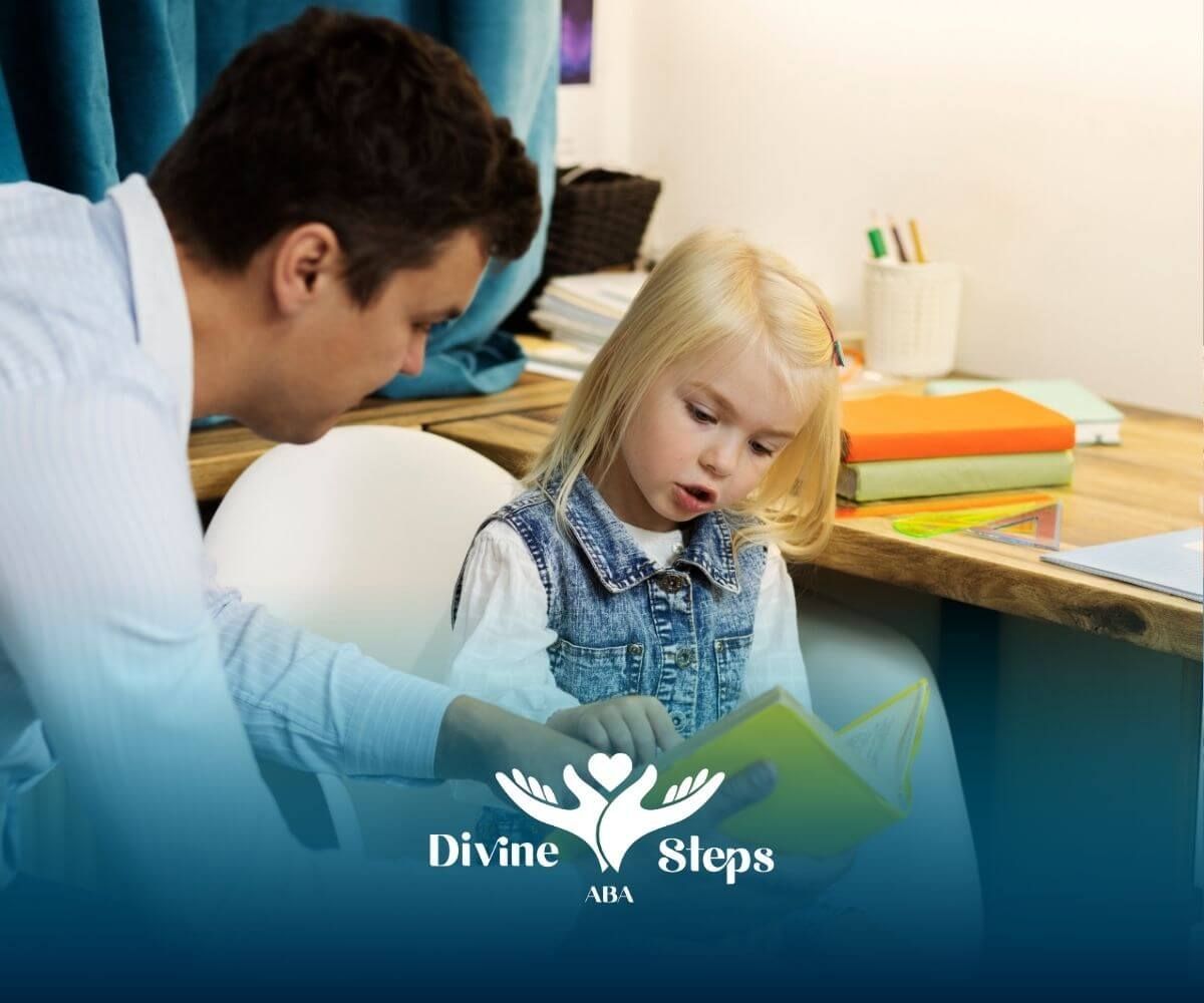 Therapist reading a book with autistic boy, helping with learning and developmental activities