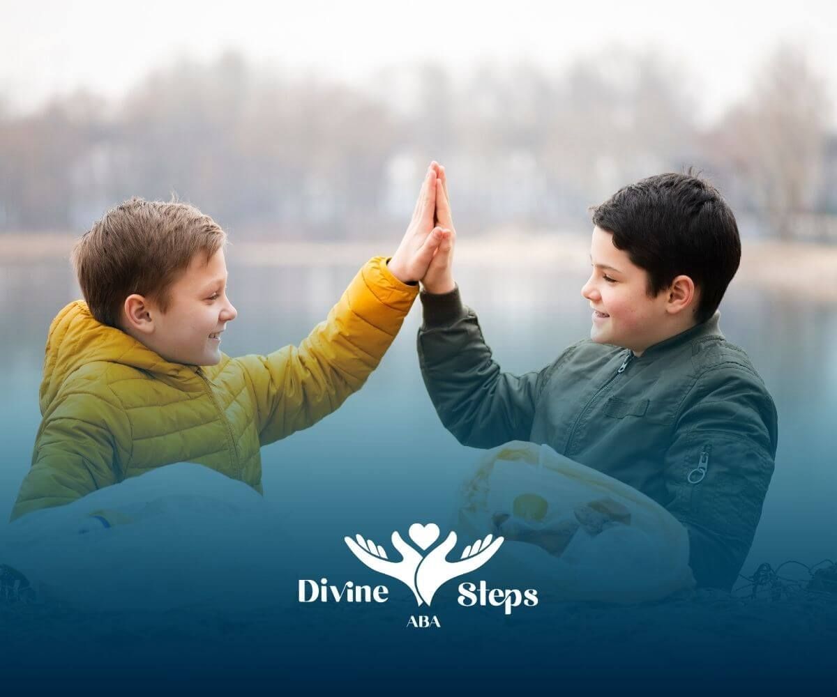 Two autistic boys high-fiving while holding bags, celebrating teamwork & positive social connection