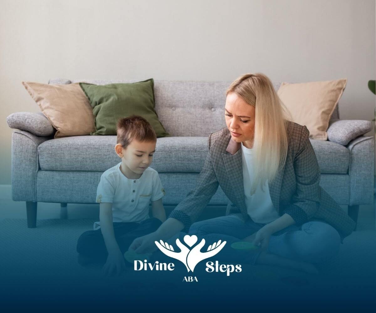 A BCBA and a child are sitting on the floor playing with toys in ABA therapy.