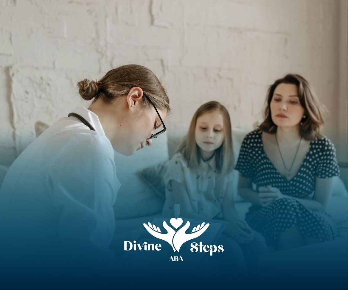 BCBA writing notes while talking to a young autistic girl and her mother during autism consultation.