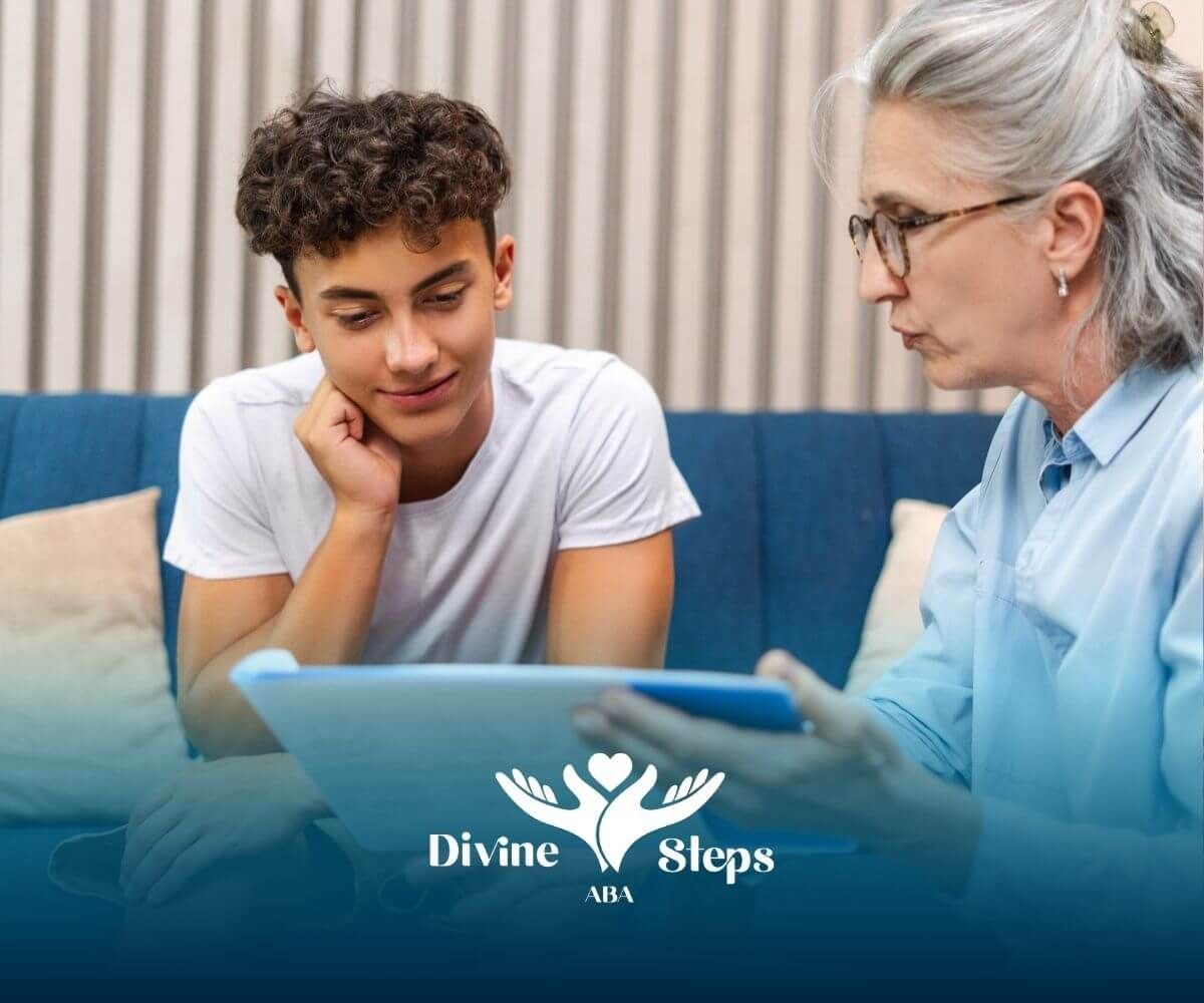 Autistic boy reviewing documents with therapist, highlighting ABA guidance, goal setting, & progress