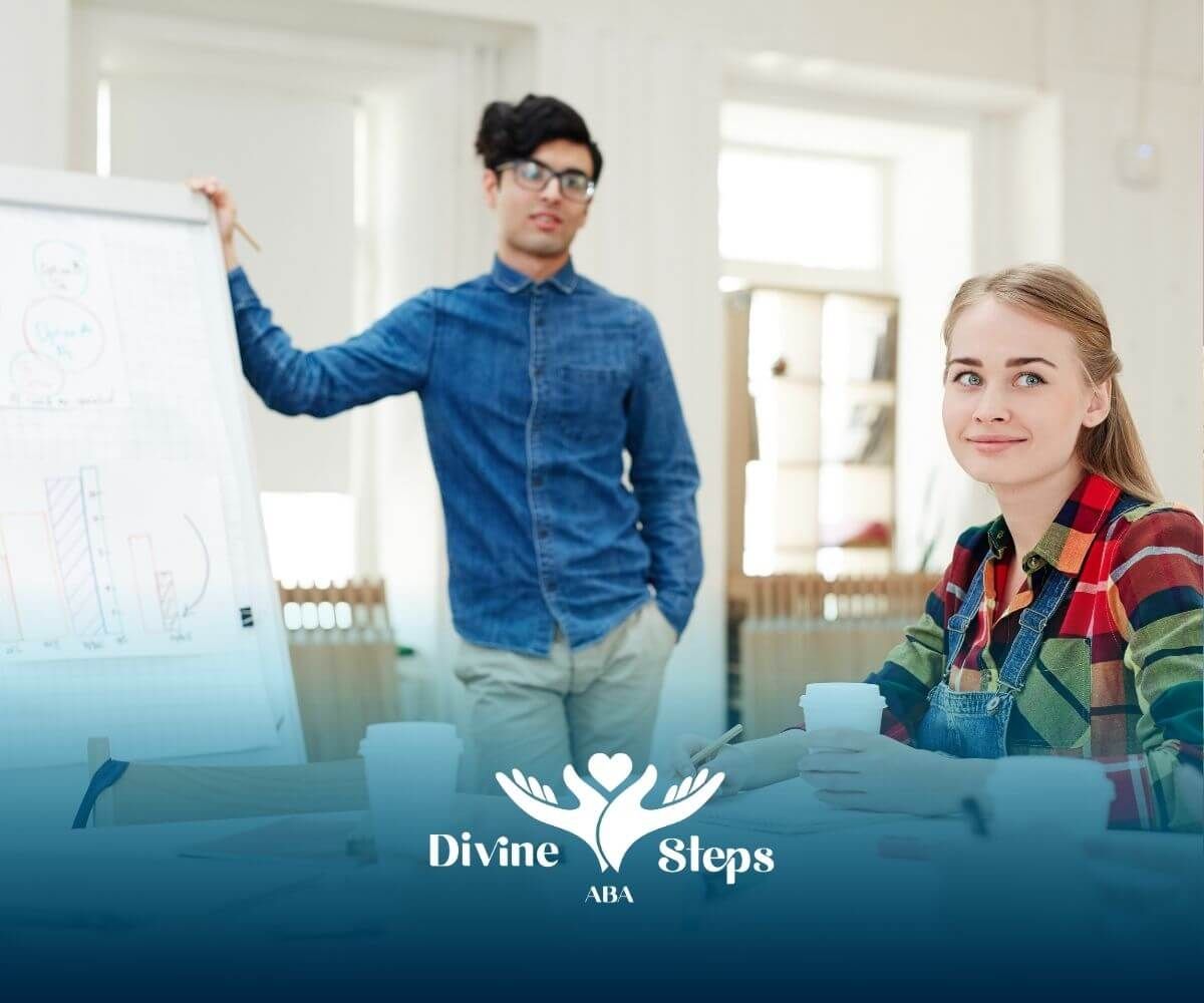 ABA meeting with presenter at whiteboard, explaining data for RBT training and collaboration.