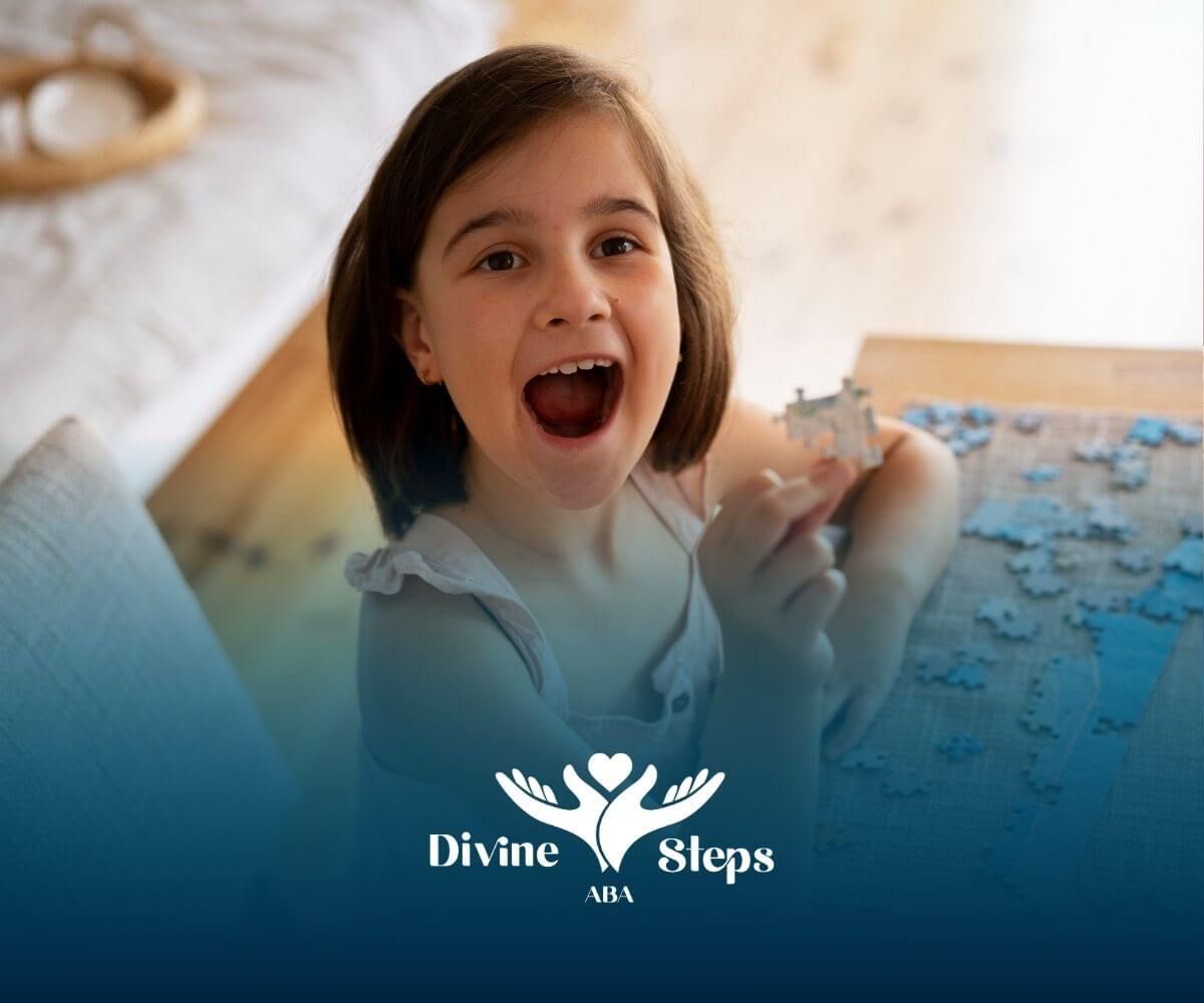 A little girl is sitting on the floor playing with a puzzle during ABA therapy