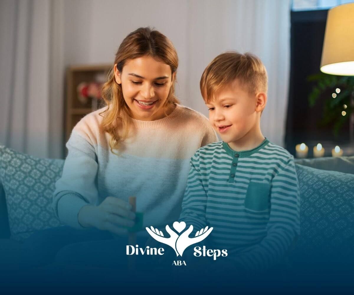 A BCBA and a young boy with autism happily play with a stacking toy in a living room.
