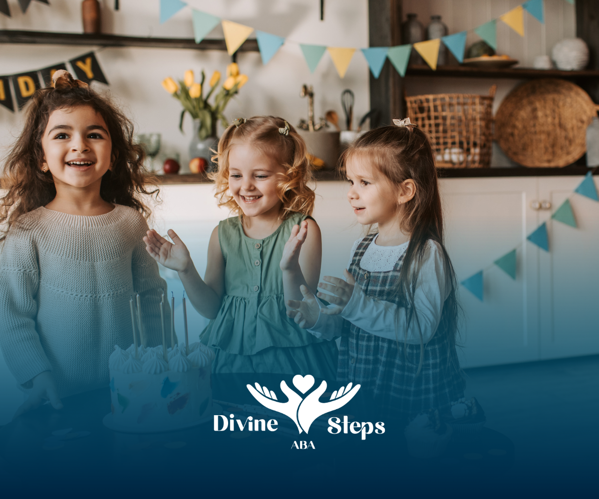 Three children smiling at a birthday cake in a decorated room with a banner.