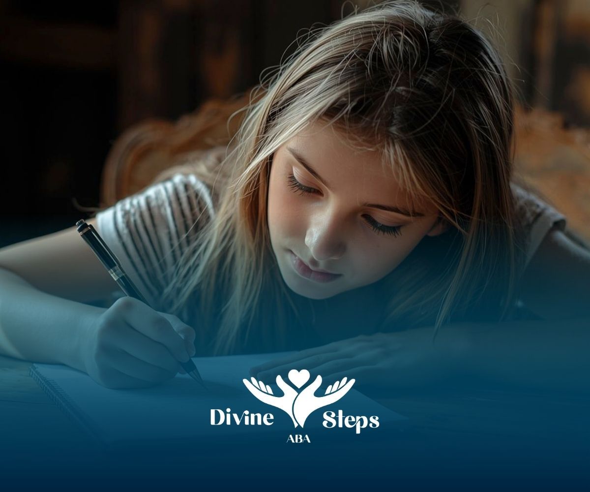 Girl writing on paper, focused expression. Divine Steps USA logo at the bottom.