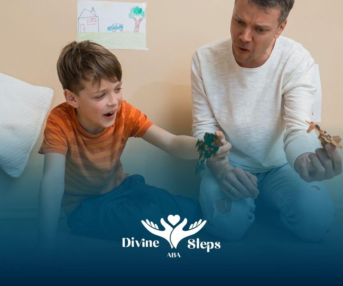 Therapist and autistic boy play with toy vehicles to build communication and social skills.