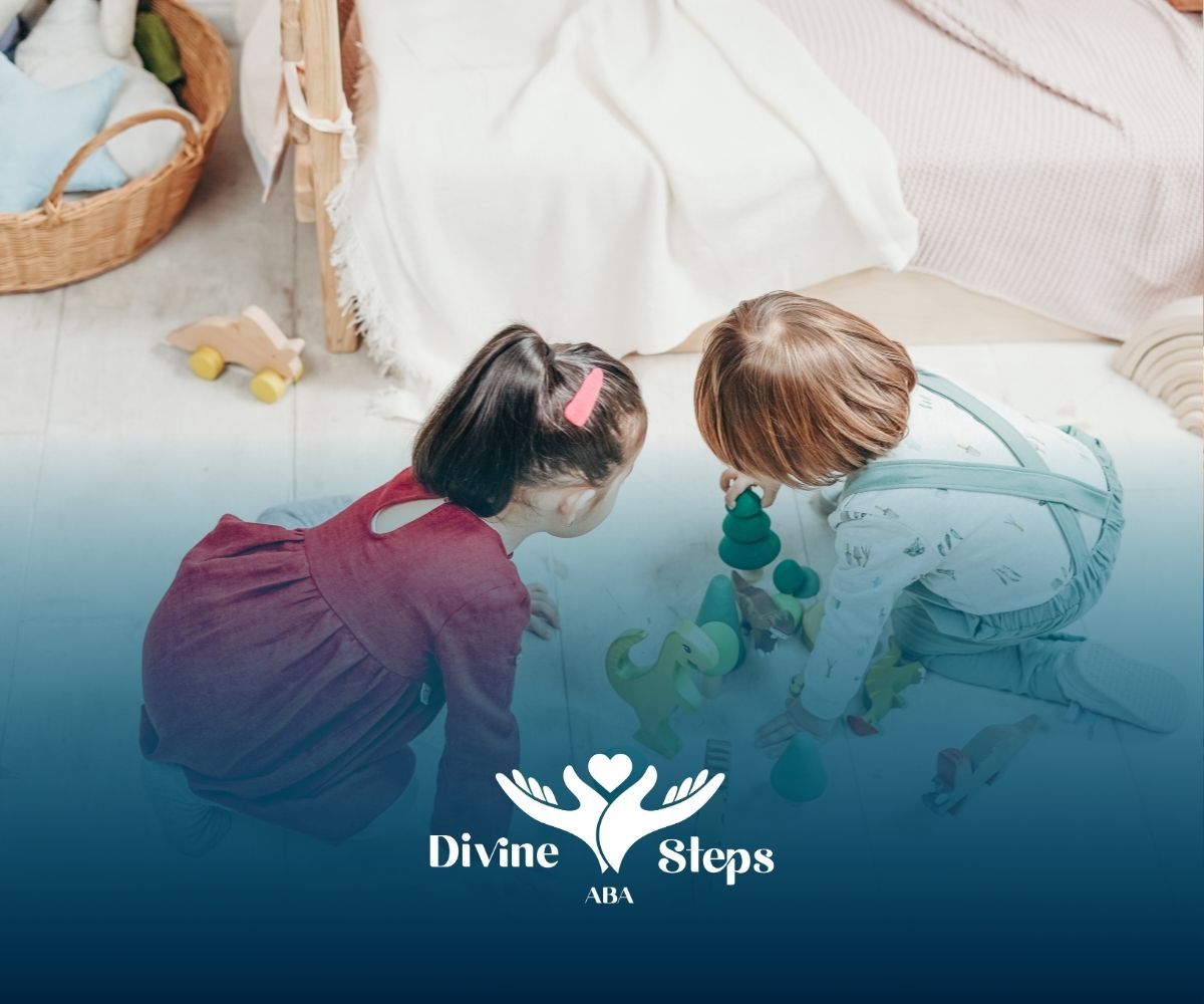 A boy and a girl are playing with toys on the floor.