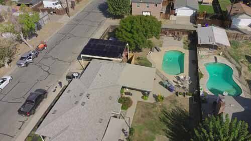 aerial view of building with solar panels