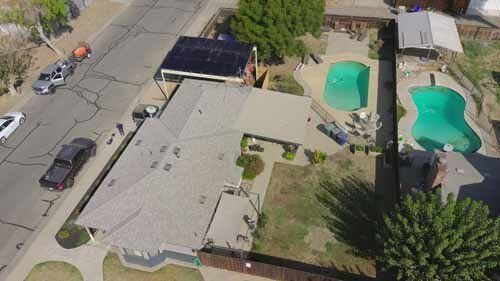 aerial view of building with solar panels