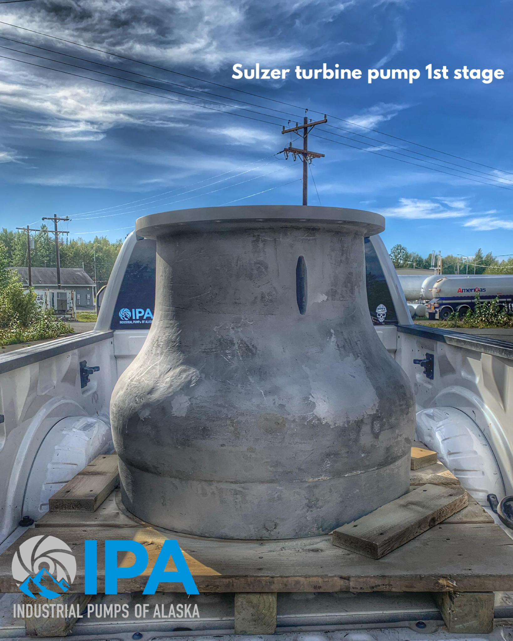 A large concrete object is in the back of a truck.