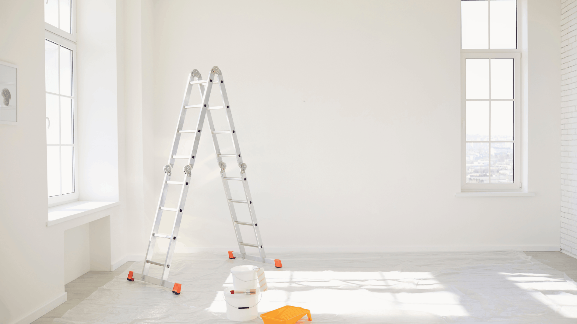 A white room with a ladder, paint cans, and a window; undergoing renovation — Rohan's Maintenance in Robina, QLD