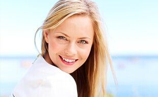Pretty woman smiling - Dental Care in San Bernardino, CA