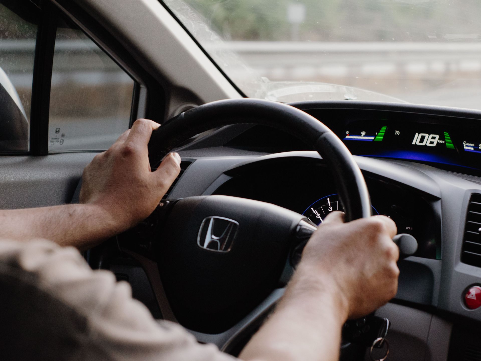 Driver’s hands on a steering wheel | Elton's Auto