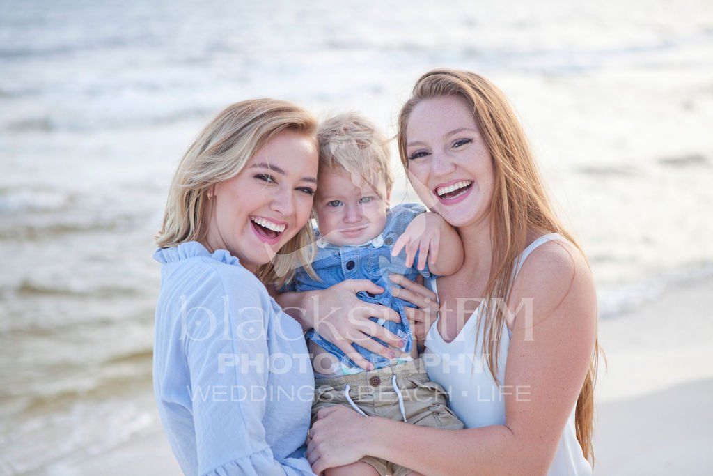Two Ladies Holding A Kid — Ft. Walton Beach, FL — Blacksuit FM Photography & Design