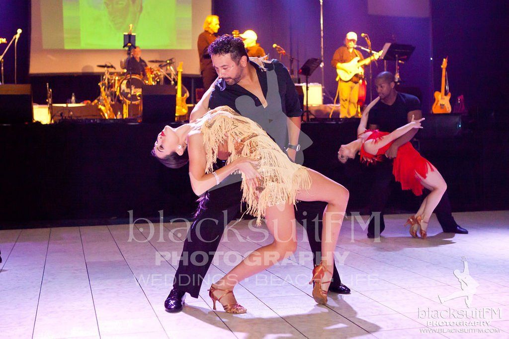 Woman Gracefully Dancing With Partner — Ft. Walton Beach, FL — Blacksuit FM Photography & Design