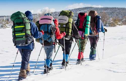 Hikers in winter mountains
