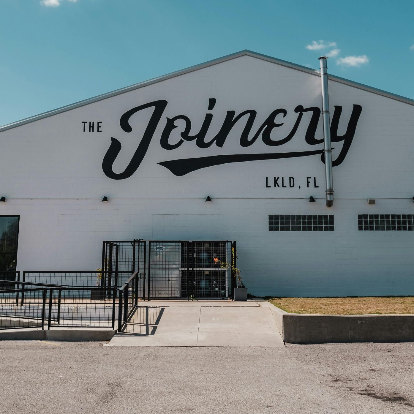 A white industrial building with 