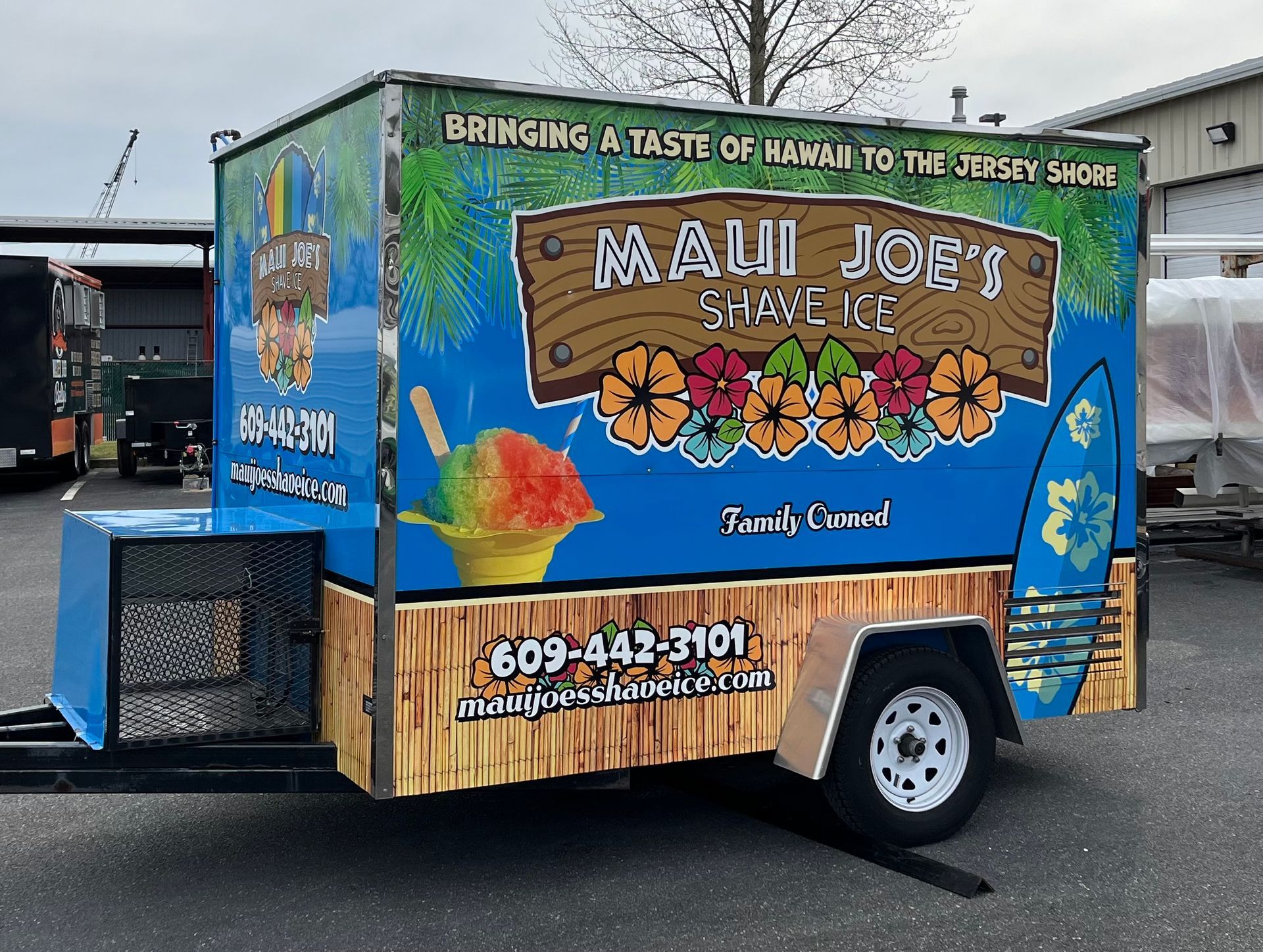 Sign for Virtua Health at Cornerstone, brown and beige with logo, near building and cars.