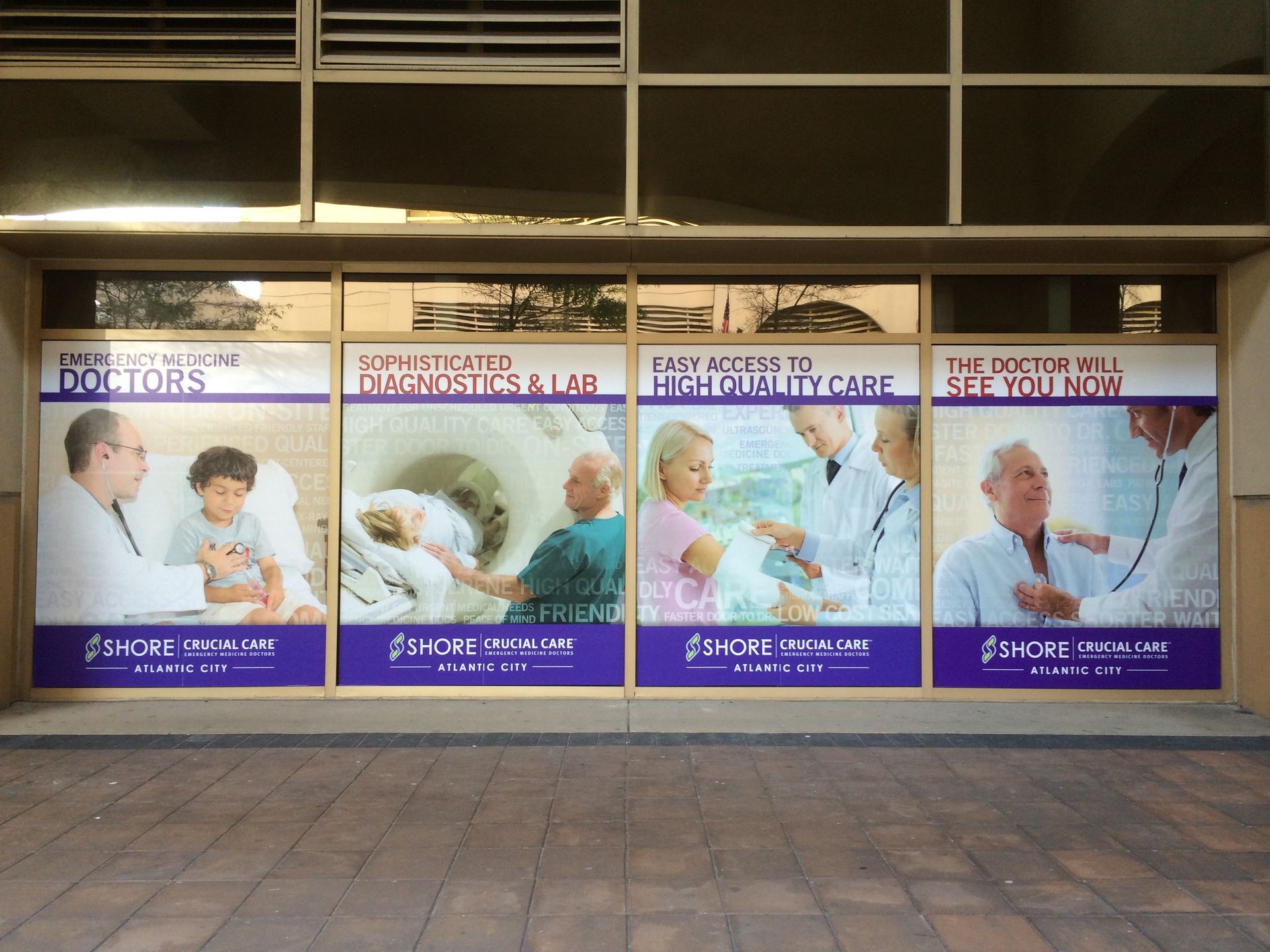 Storefront display with medical themes: doctors, patients, and medical equipment.