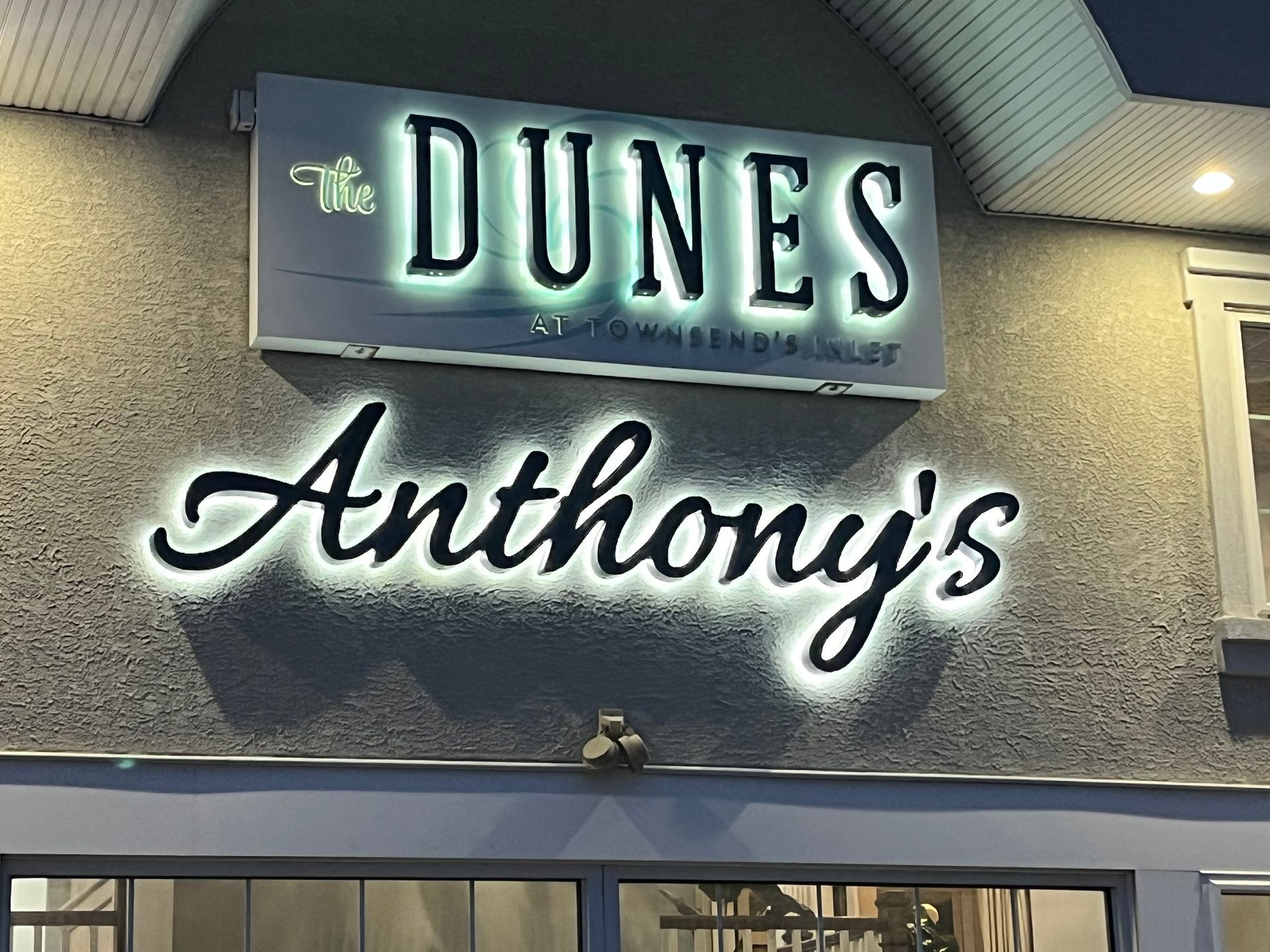 Sign for an office building with tenant names and the address 650.