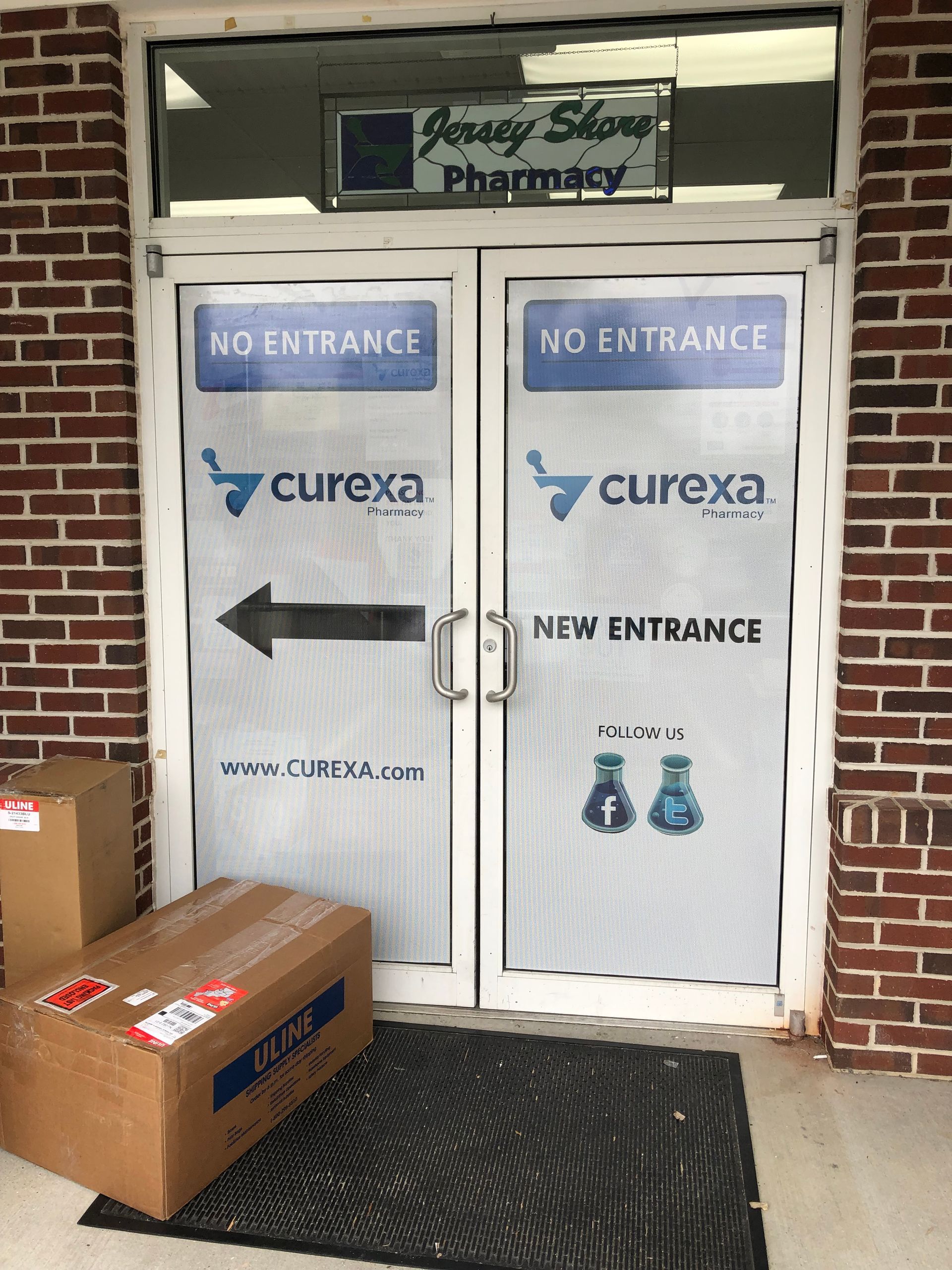 Exterior of a pharmacy door with 
