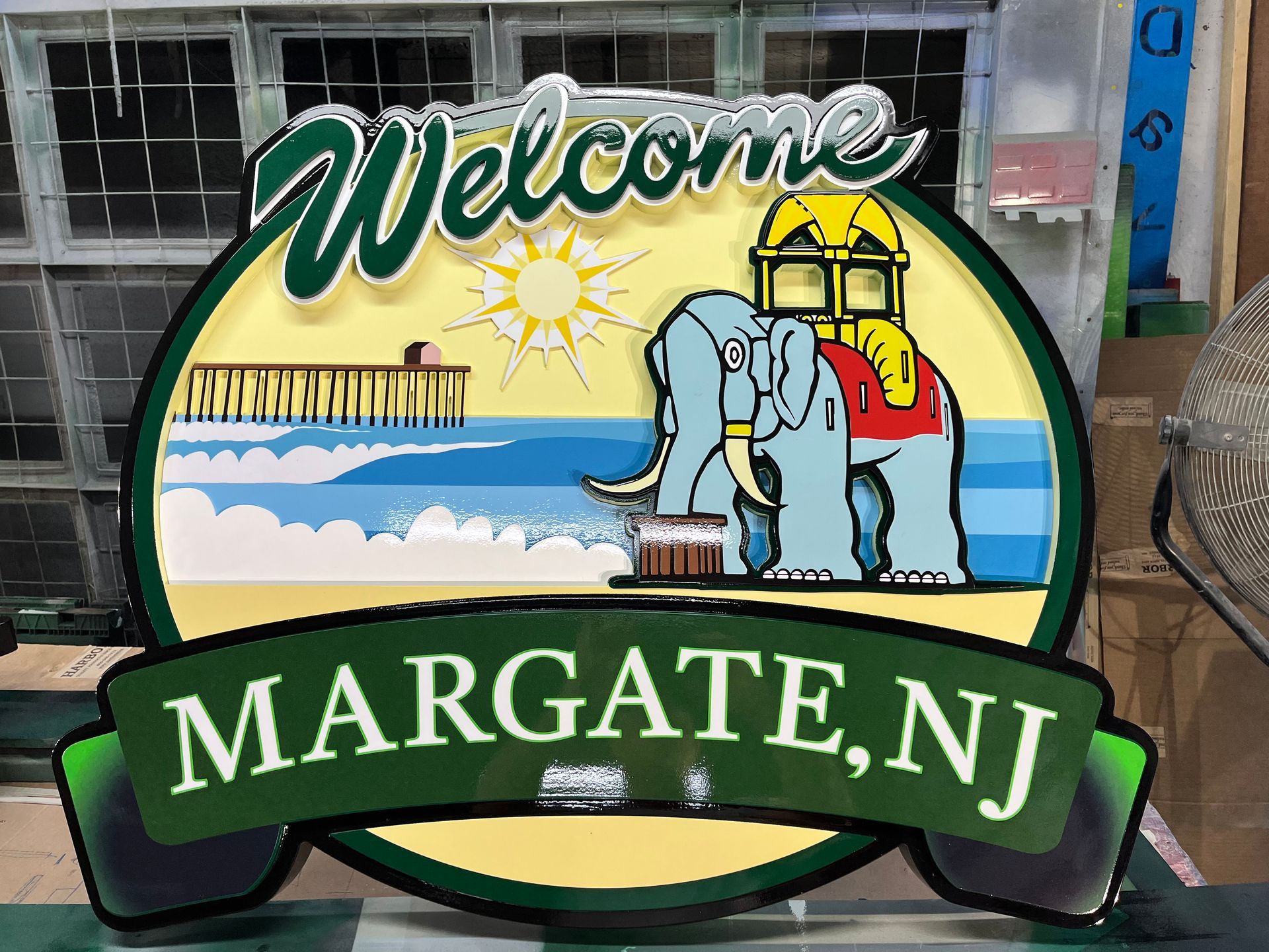 Welcome sign for Margate, NJ, featuring a beach scene with Lucy the Elephant and a pier.