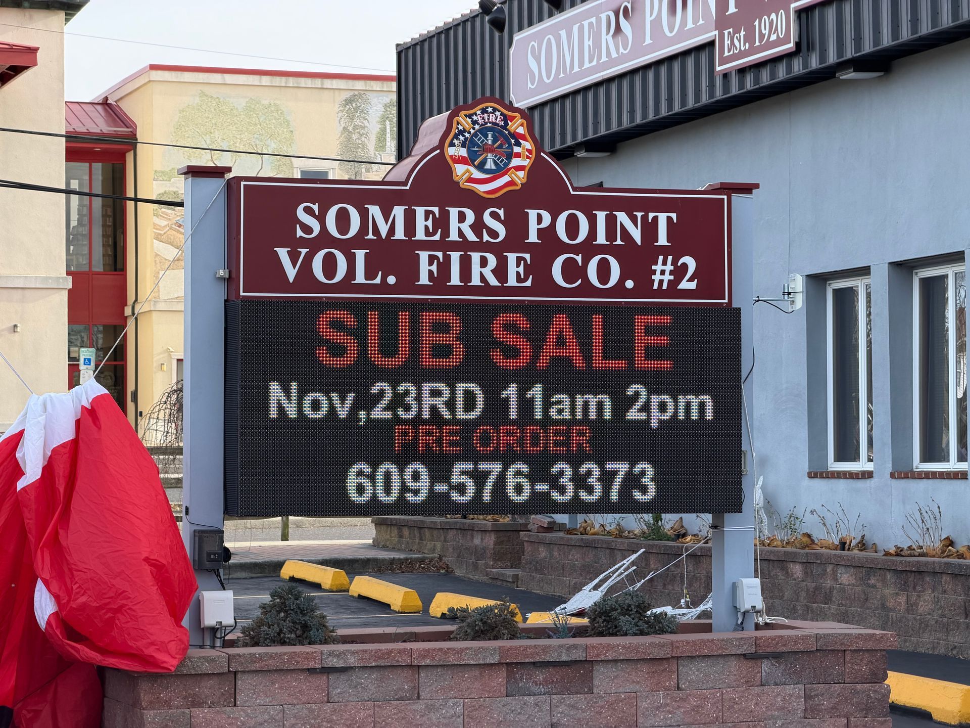 Sign for Somers Point Volunteer Fire Co. #2, advertising a sub sale on Nov. 23rd, 11am-2pm, with phone number 609-576-3373.