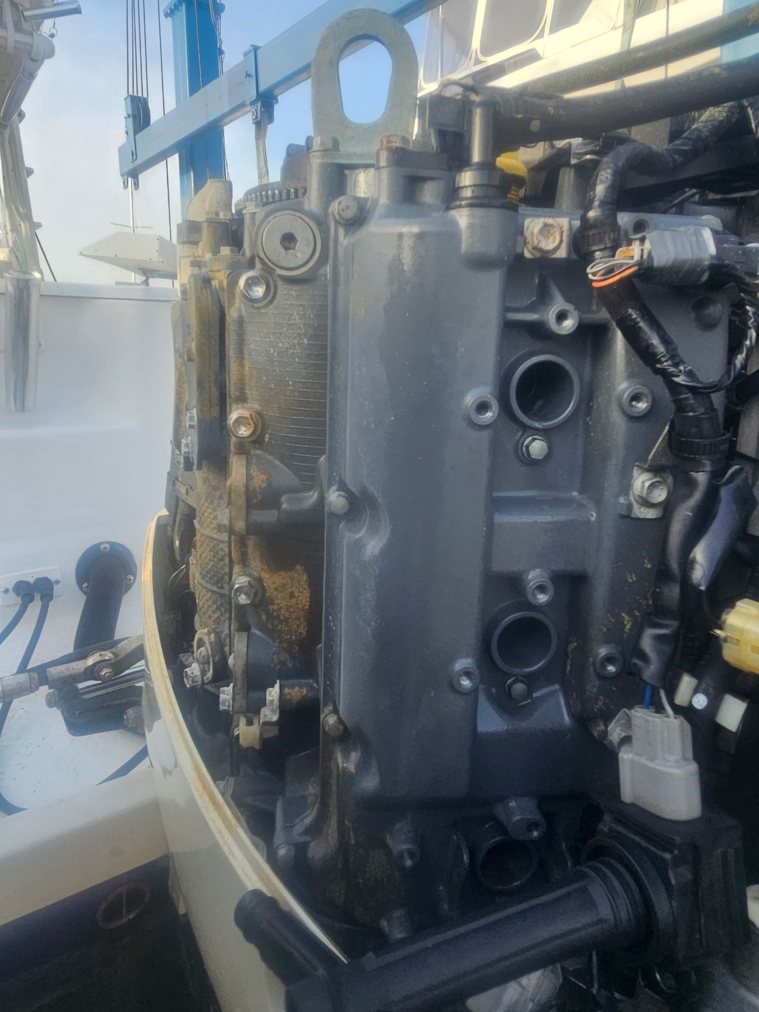A close up of a boat engine on a boat.