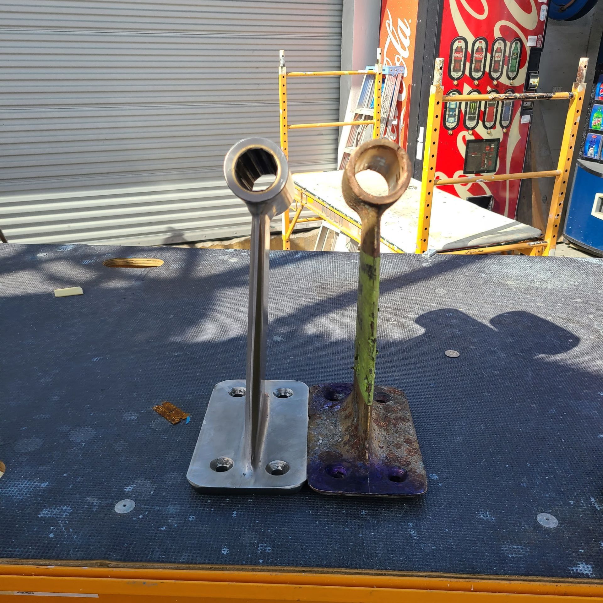 A coca cola vending machine is visible in the background