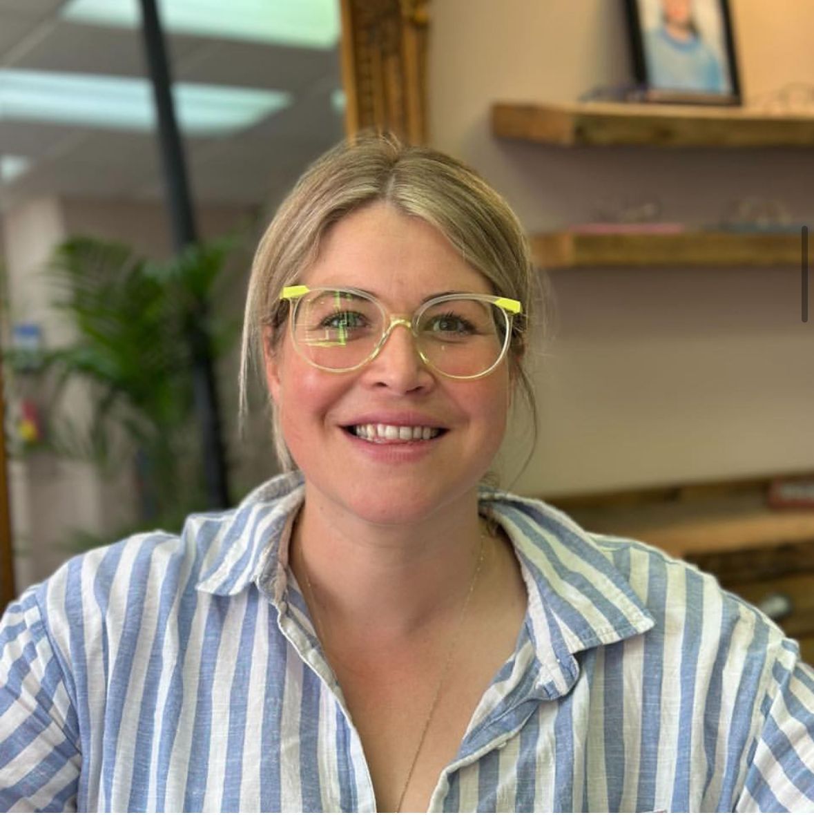 smiling lady in beautiful glasses