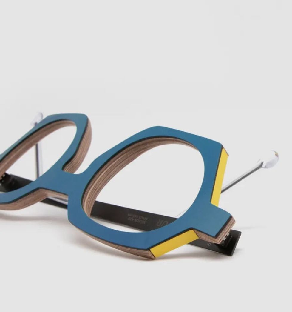 A blue and yellow Nina Mur frame