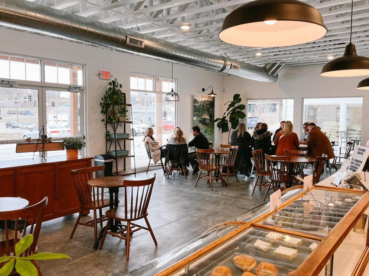 A Group of Customers Sitting at Tables in Three Story Coffee, a Coffee Shop in Jefferson City, MO.