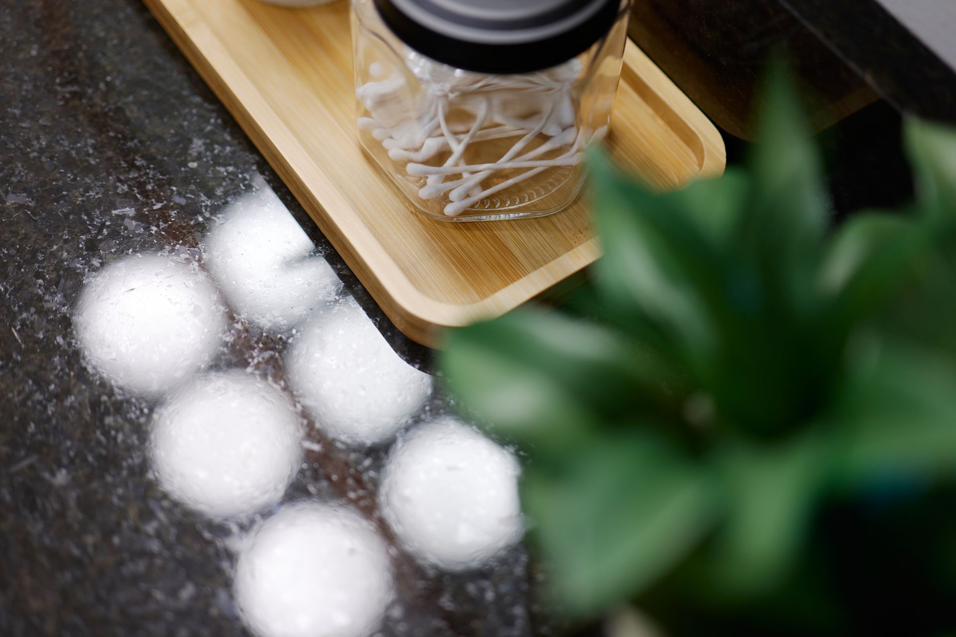 A Jar of Q-Tips on a Countertop. Check Out Three Story Coffee's Vacation Rental in Mid-Missouri.