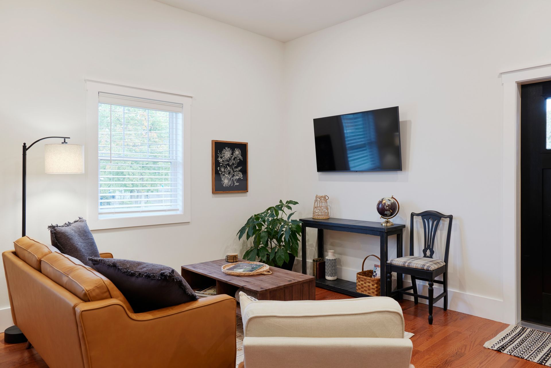 A Cozy Minimal Living Room, From Three Story Coffee's Vacation Rental in Jefferson City, MO.