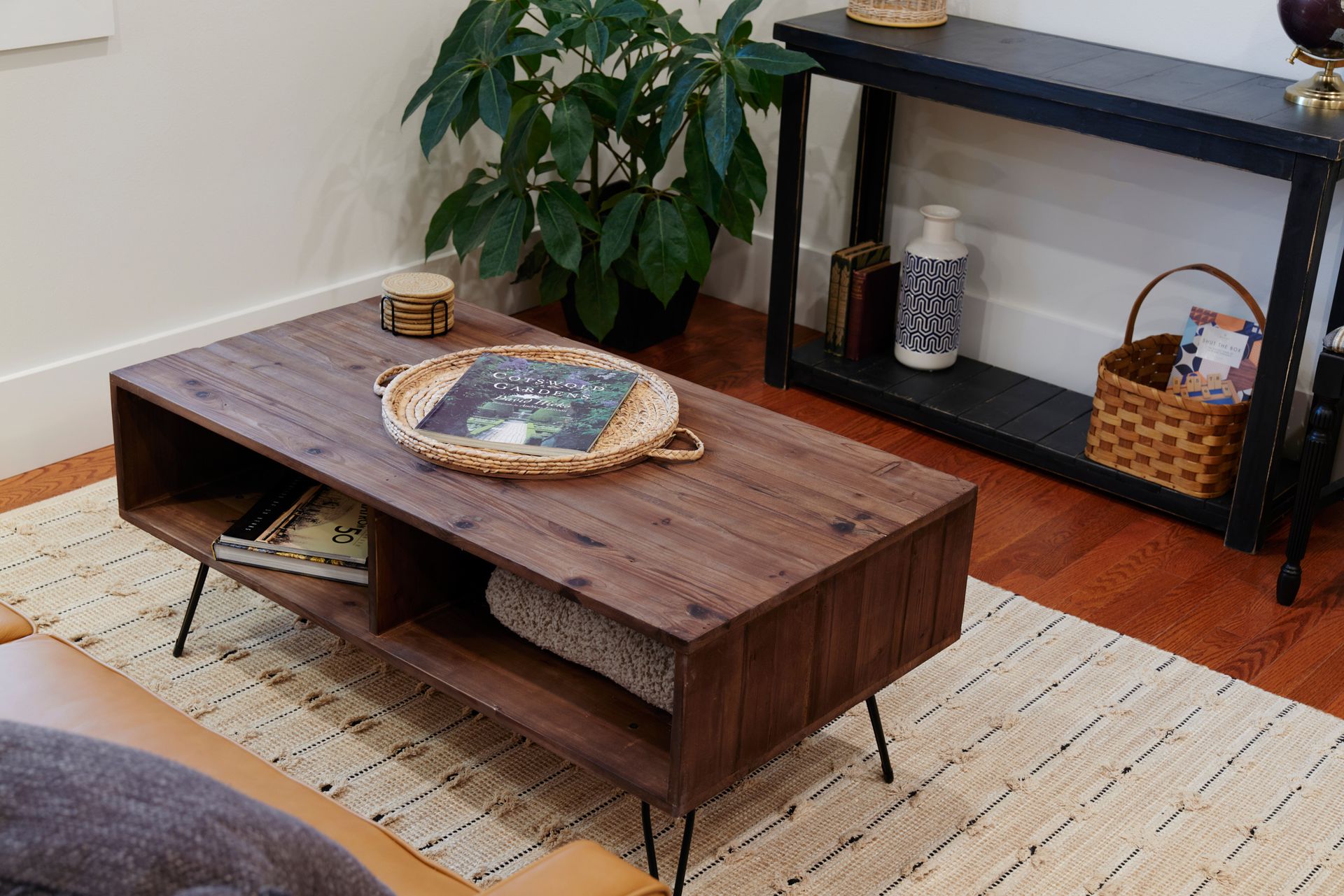 Full View of Coffee Table & Book at Three Story Coffee's Vacation Rental in Jefferson City, MO.