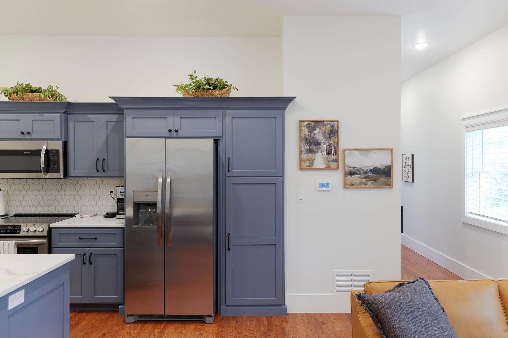 Wide View of Kitchen & Couch at Three Story Coffee's Vacation Rental in Jefferson City, MO.