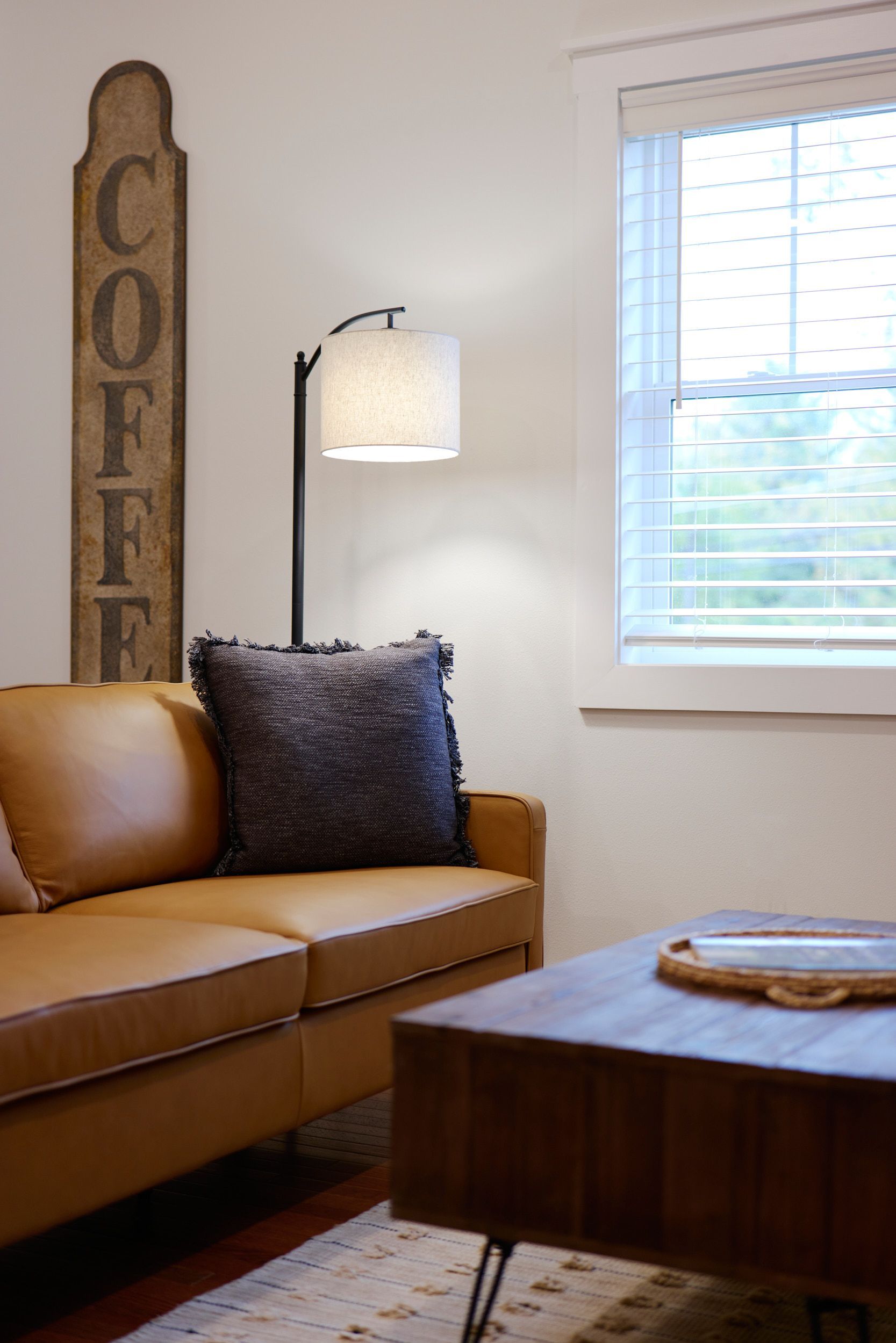 Closeup of Living Room Couch at Three Story Coffee's Vacation Rental in Jefferson City, MO.