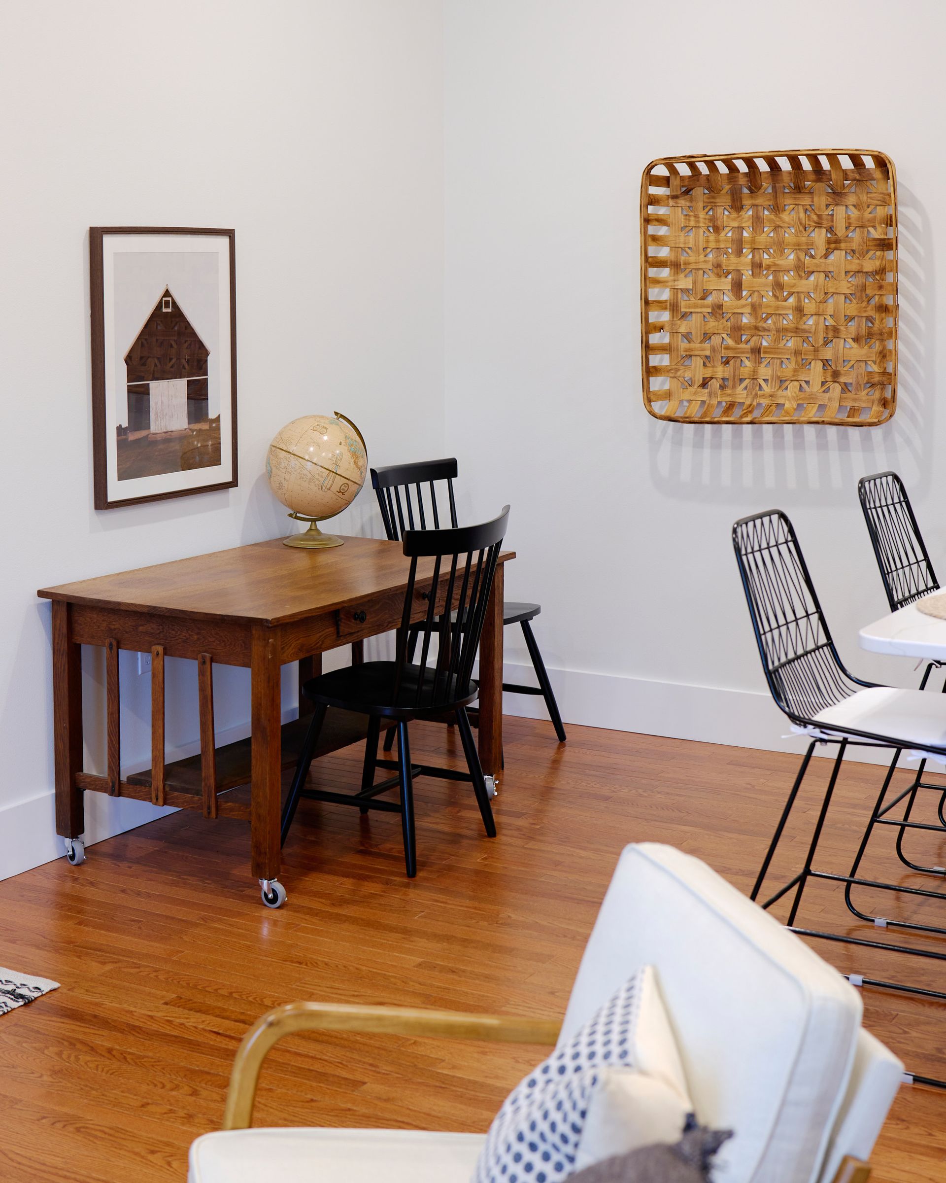 A Study Desk With a Globe on Top at Three Story Coffee's Vacation Rental in Jefferson City, MO.
