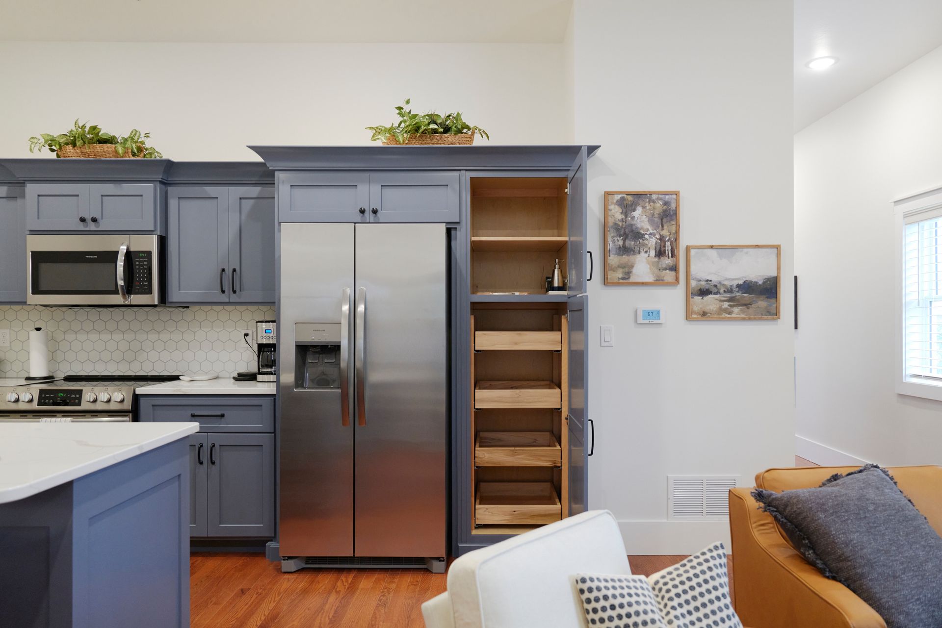 Beautiful Kitchen of Three Story Coffee's Vacation Rental in Jefferson City, MO With Blue Cabinets.