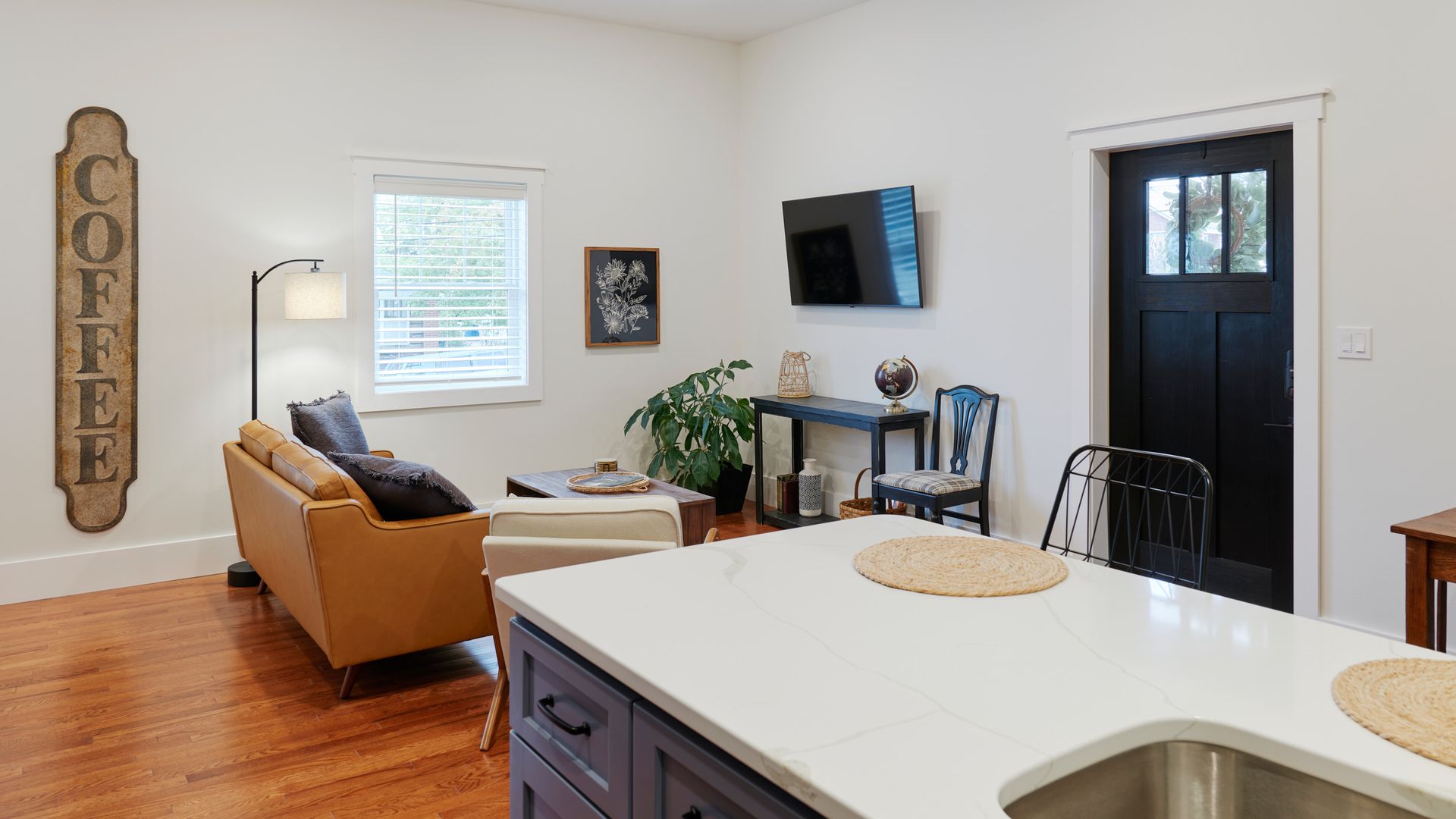 Kitchen Counter & Living Room at Three Story Coffee's Vacation Rental in Jefferson City, MO.