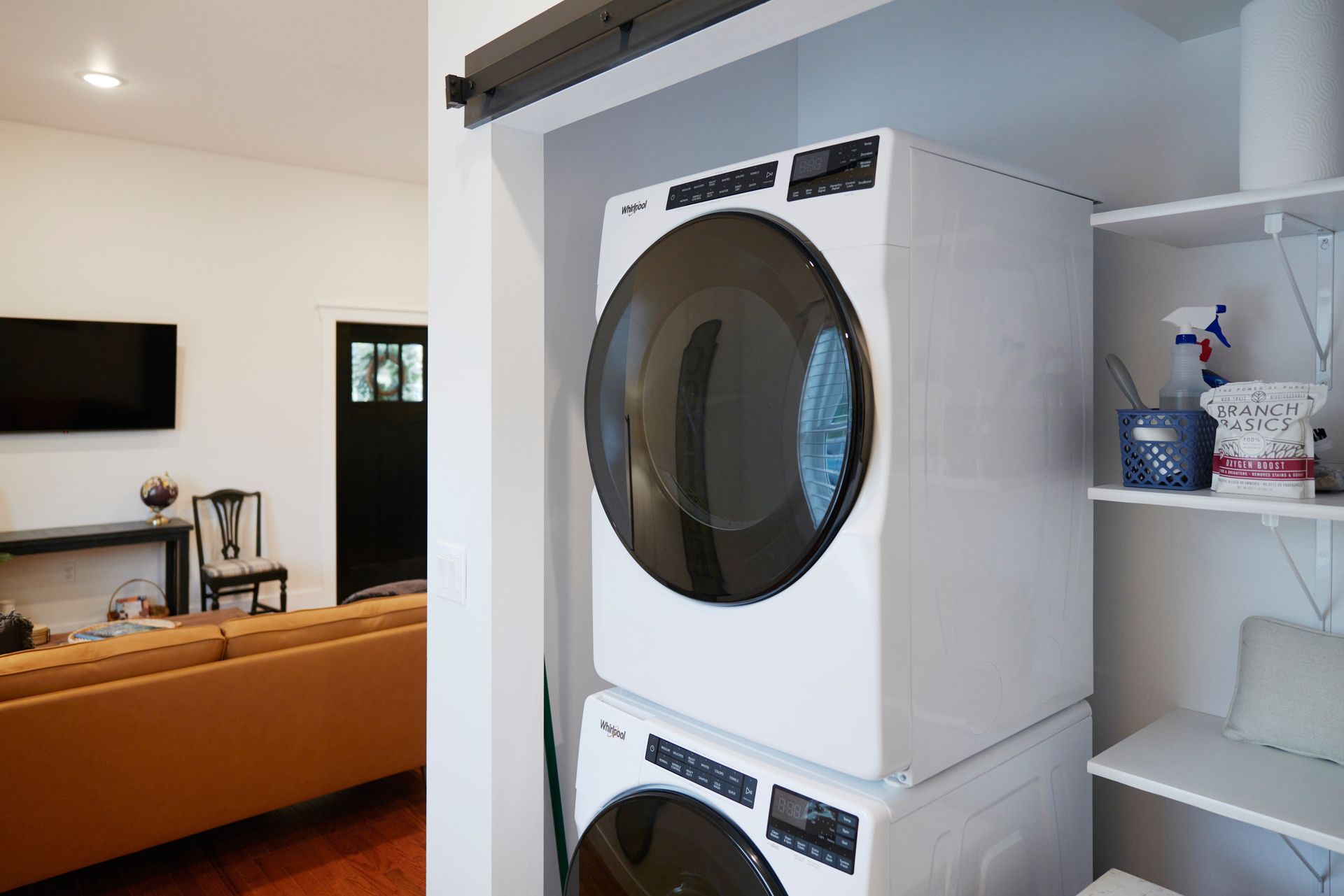Stacked Washer & Dryer in Three Story Coffee's Convenient Rental Space.