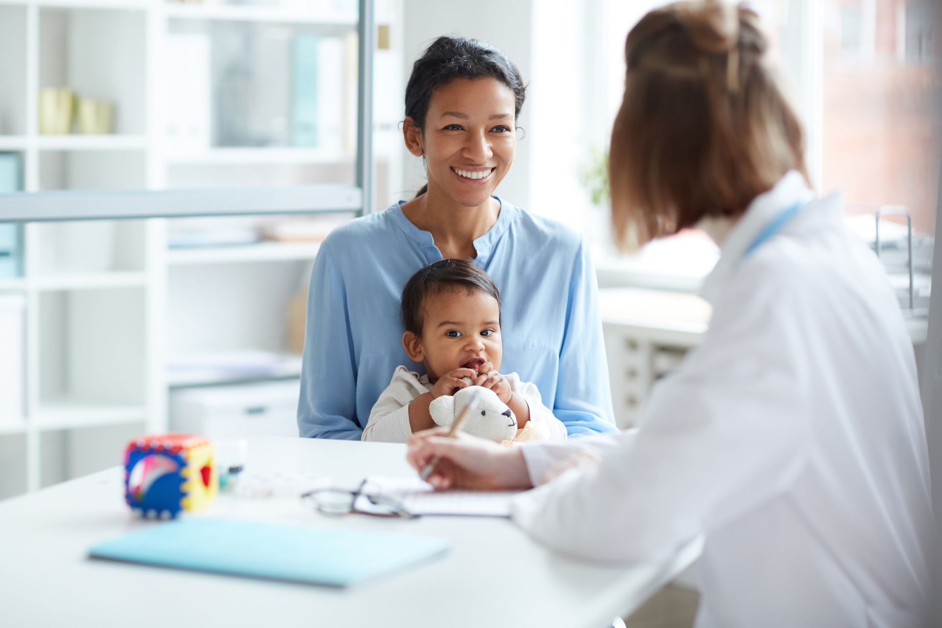 parent, doctor, and baby having a medical consultation