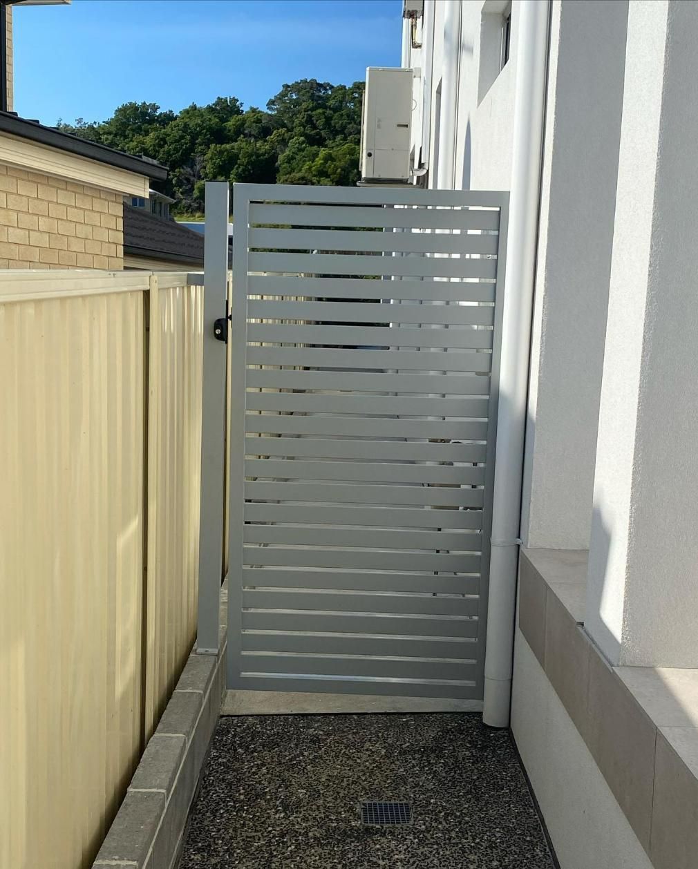 A Fence with A Gate in The Middle of It — Optimum Aluminium Fabrication in Barrack Heights, NSW
