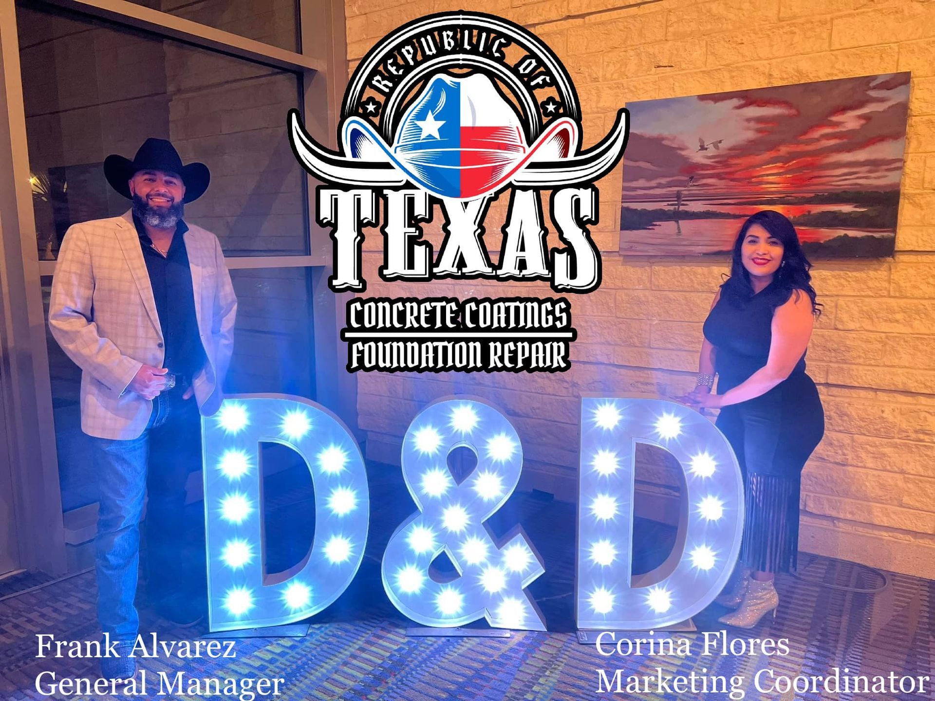 Two people pose with illuminated 