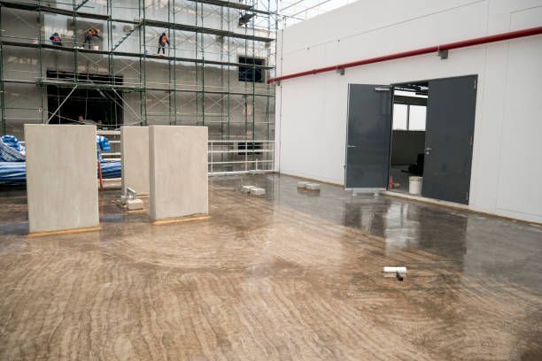 Commercial epoxy flooring applied with epoxy paint for waterproof protection in an industrial space.
