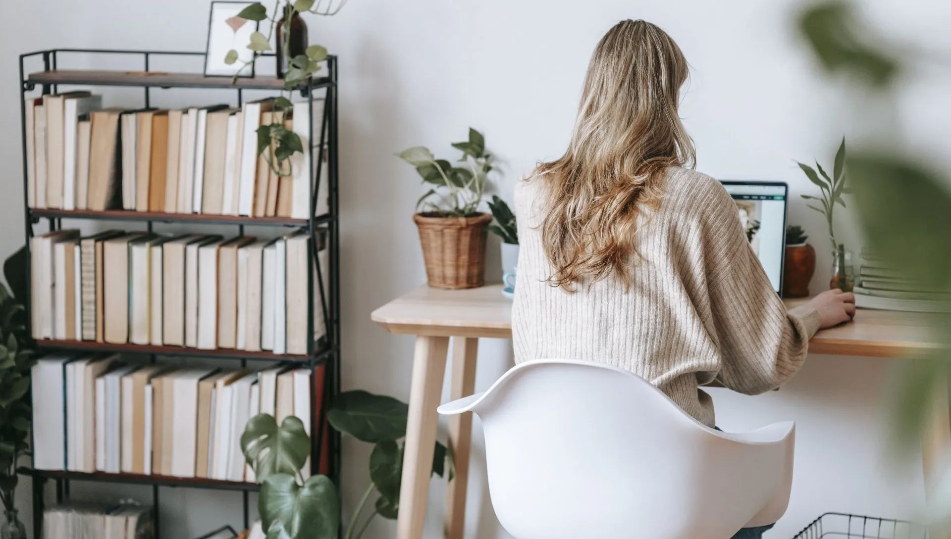 Woman working at desk at home