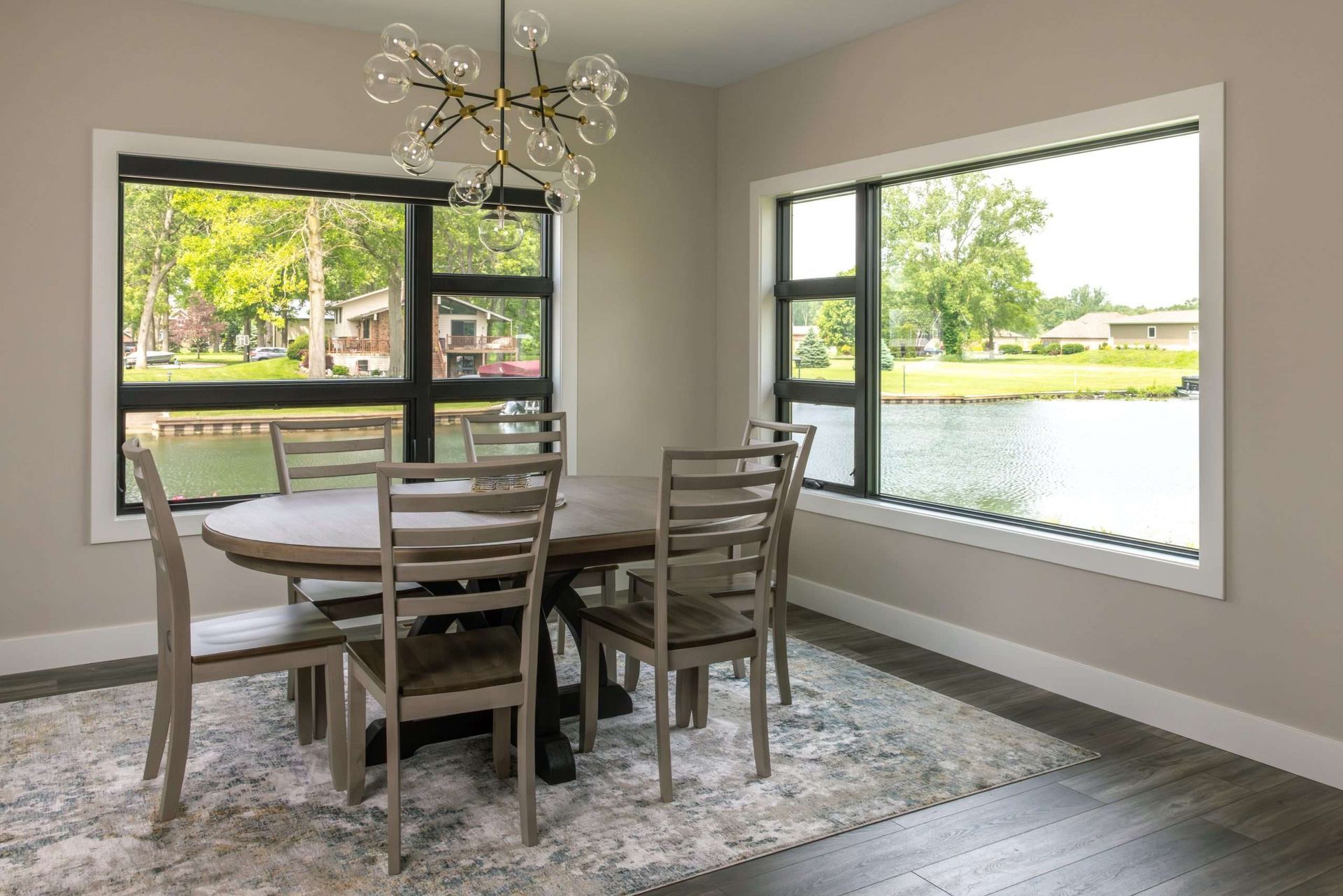 A kitchen with stainless steel appliances , wooden cabinets , and a large island.