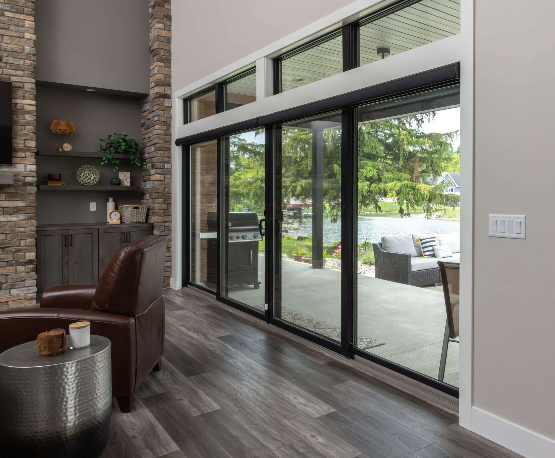 A kitchen with white cabinets and stainless steel appliances.